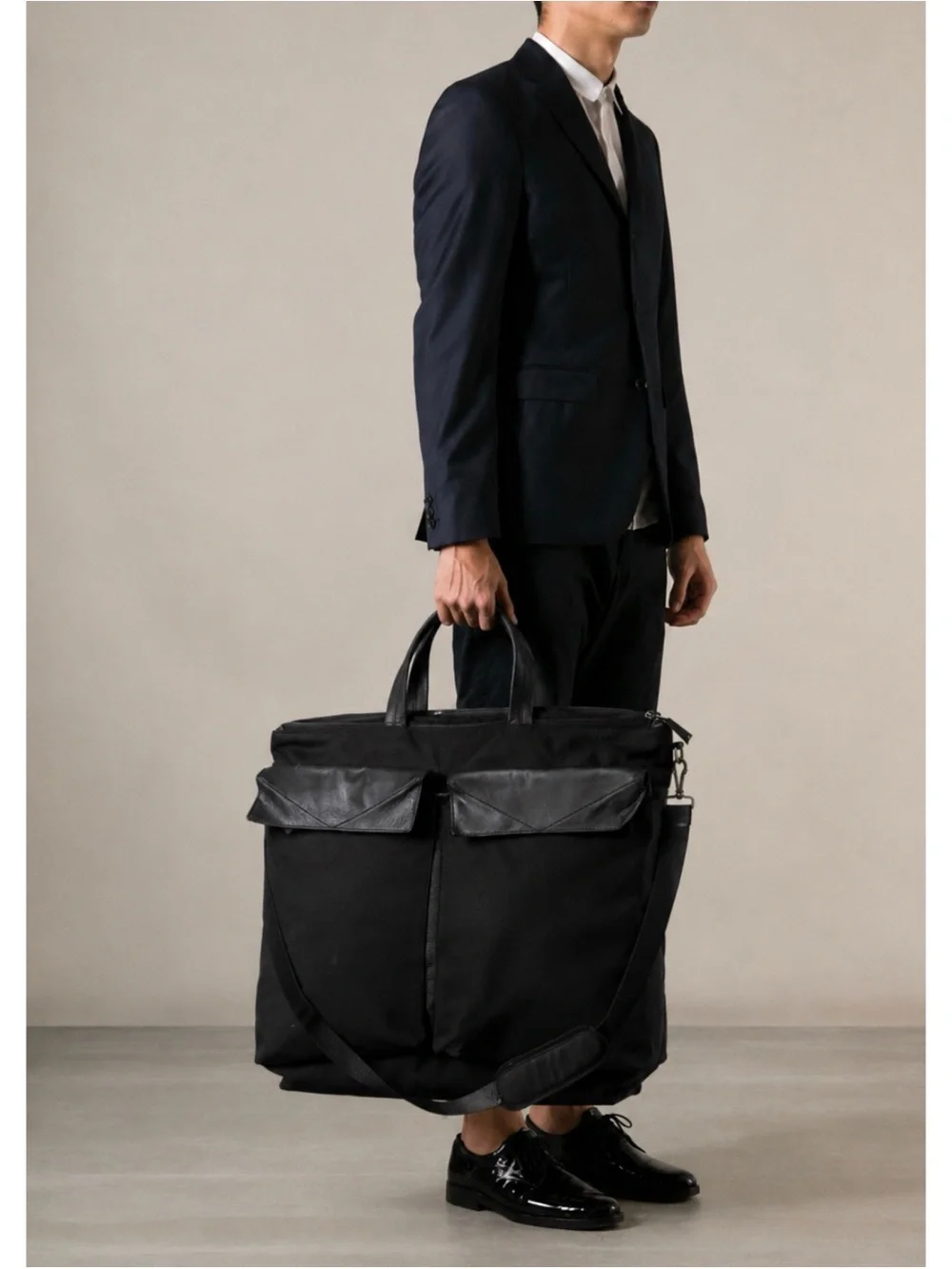 RO  RMD STUDIO PRESENTS Canvas Leather Trim Oversized Messenger Bag in Black